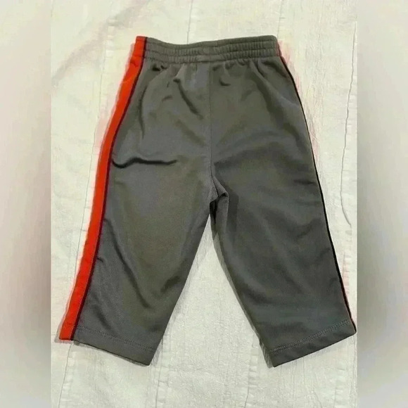 Nike - grey and orange track pants. Size 9  months - Picture 2 of 2